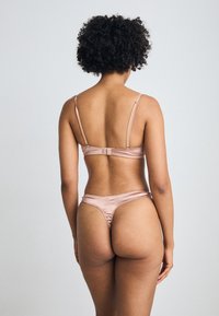 Lindex String - beige