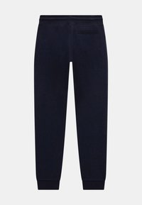 Marineblaue Sweatpants mit elastischem Bund und Bündchen an den Knöcheln. Verfügt über eine einzelne Gesäßtasche und einen weichen, strukturierten Stoff. Einfaches, tailliertes Design.