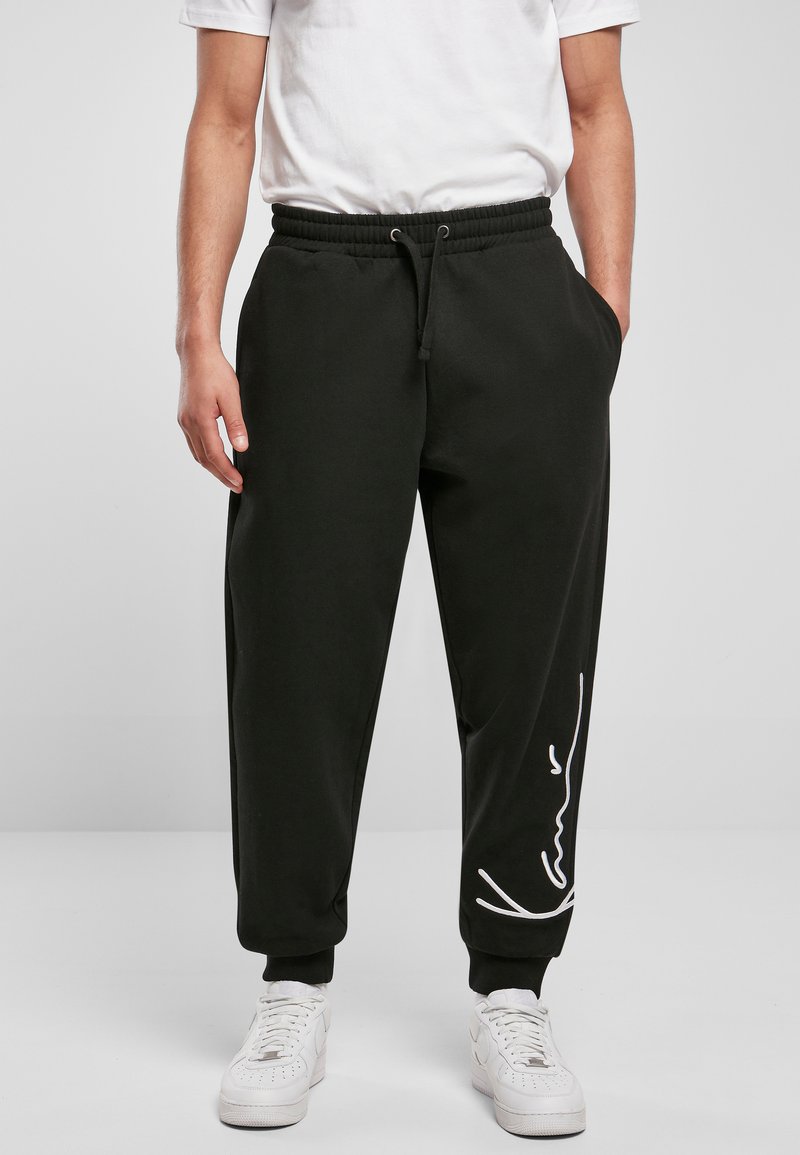 Karl Kani Tracksuit bottoms black Zalando.de