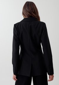 TUSSAH VALERIA  - Īss mētelis - black