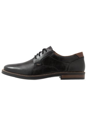Schwarze Leder-Oxford-Schuhe mit glatter Oberfläche, runder Zehenform und braunem Absatzakzent. Verfügt über eine Schnürverschluss und kontrastierende Nähte.