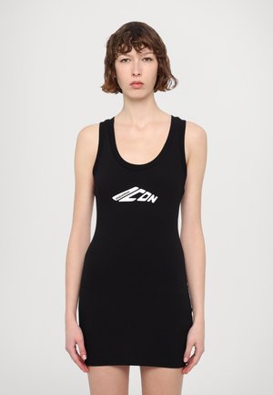 Black sleeveless dress made of smooth fabric, featuring a scoop neck and a white logo design at the center. Fitted silhouette.