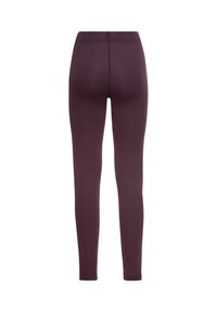Leggings borgogna con una texture liscia, design aderente e vita alta. Presentano un leggero coste verticali su tutto il tessuto.