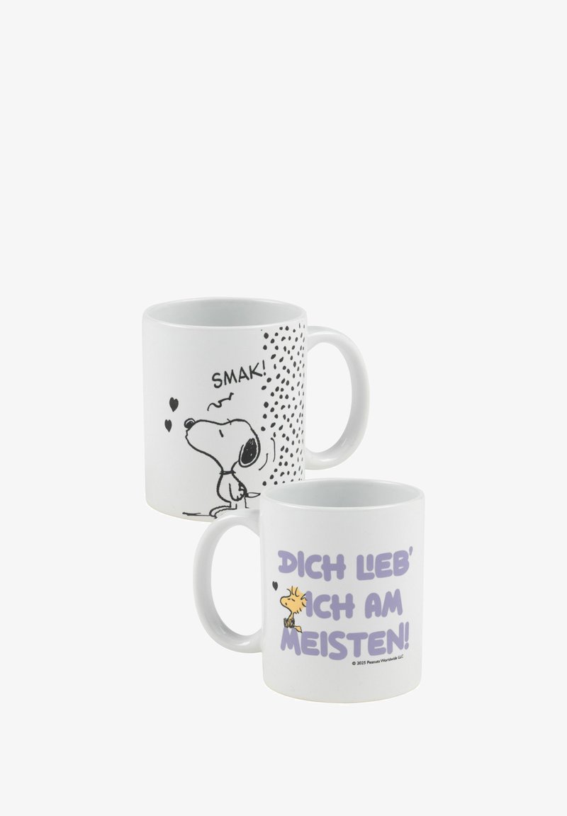 White ceramic mugs feature black and purple graphic prints. One shows a cartoon dog with the text "SMAK!" and the other displays "DICH LIEB' ICH AM MEISTEN!" with a character illustration.