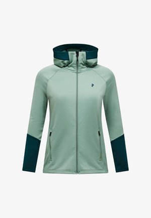Giacca verde chiaro con zip e cappuccio, polsini e interno colletto verde scuro, tasche frontali con zip e piccolo logo sul petto.