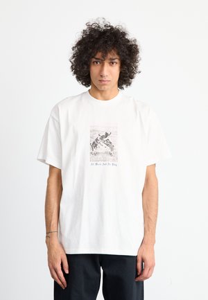 White cotton t-shirt featuring a centered graphic print in black and gray, depicting figures with the text "All Work And No Play." Short sleeves.