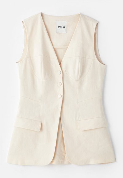 Beige mouwloze vest met een getailleerde voorkant, zes knopen, twee voorzakken en gebogen naden. Gemaakt van lichtgewicht stof.