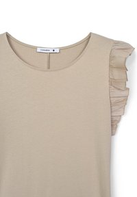 Top corto beige a maniche corte realizzato in tessuto morbido, con scollatura rotonda e dettagli arricciati testurizzati sulle spalle. Etichetta della taglia: S.