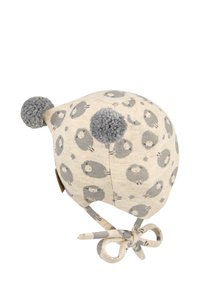 Beige knitted baby hat with gray sheep patterns, two gray pom-poms on top, and ties at the chin for securing.