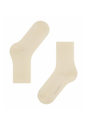 Calzini beige con una texture liscia, lunghezza standard alla caviglia, punte e talloni rinforzati. Logo del marchio visibile su un calzino.