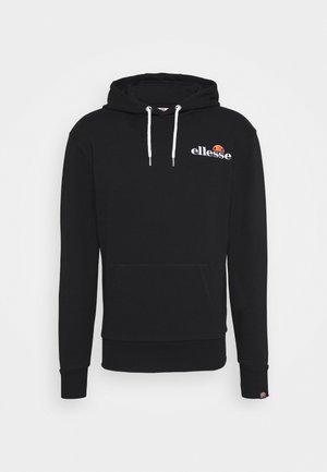 Sort hættebluse lavet af bomuld med en kængurulomme, hvide snørrebånd og broderet "ellesse" logo med en flerfarvet accent.