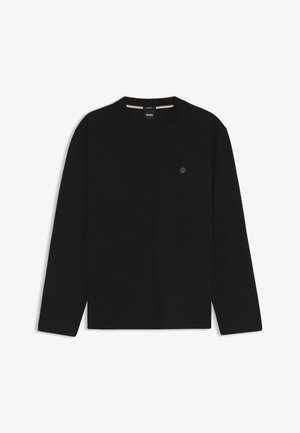 Musta, pitkähihainen pyöreäkauluksinen paita, jossa on hillitty logo vasemmassa rinnassa ja pieni bränditunniste kauluksen sisäpuolella.