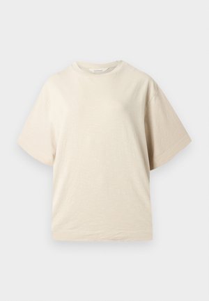 Beige kortermet T-skjorte med rund hals, avslappet passform og ensfarget design, vist på en nøytral bakgrunn.