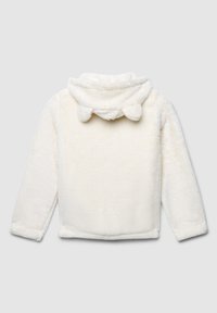 Biała, puszysta kurtka z wysokim kołnierzem i uroczymi, zaokrąglonymi detalami przy szyi; ma długie rękawy i miękką teksturę.