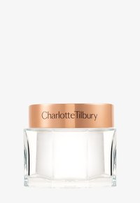 Clear glass jar with hexagonal shape, featuring a rose gold metal lid etched with "Charlotte Tilbury." Smooth texture, minimalist design.