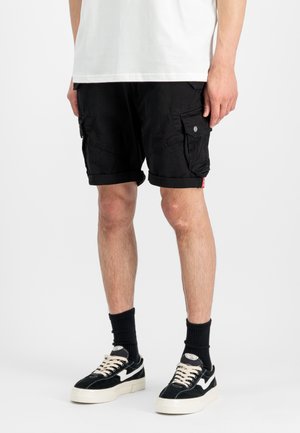 COMBAT - Shorts - black