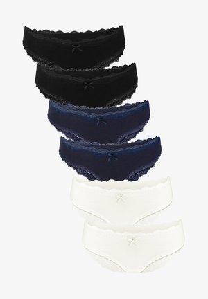 Set of five pairs of lingerie, featuring black, navy, and white fabric with lace trim and small bow accents at the front.