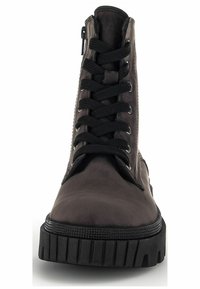 Black leather ankle boot featuring lace-up front, metal eyelets, textured sole, and side zipper for easy access. Smooth surface finish.