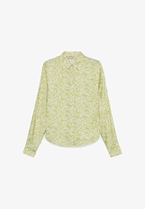 Camicia a maniche lunghe con bottoni e colletto appuntito, con motivo floreale verde chiaro su sfondo bianco.