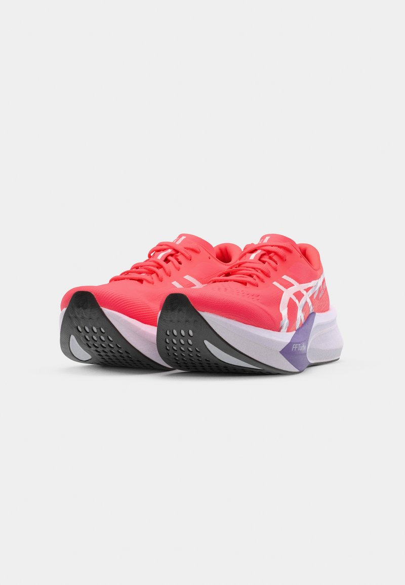 Bright pink running shoes with a textured mesh upper, cushioned sole, and black rubber outsole. Features white branding and accents.