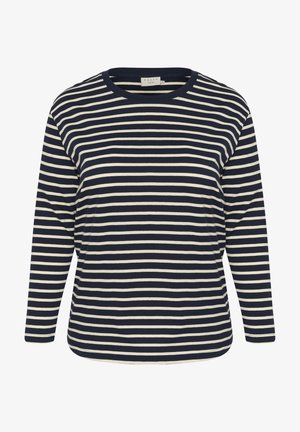 Tume sinise ja kreemjate triipudega pikkade varrukatega T-särk ümmarguse kaelusega ja lõdva istuvusega. Valmistatud pehmest kangast, millel on sile tekstuur.