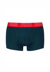 Boxer da uomo Puma in verde scuro con vita rossa e logo "PUMA" bianco. Tessuto morbido con design aderente e dettagli cuciti.