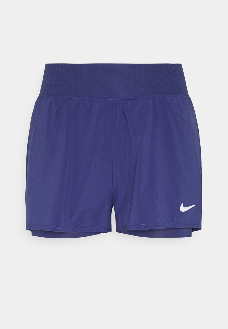 Marina atletiska shorts med ribbad elastisk midja, utformade för komfort. Har en vit Nike-logotyp längst ner till vänster på framsidan.