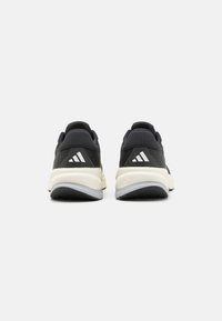 adidas Performance SUPERNOVA SOLUTION - Chaussures de running sur route - core black/carbon