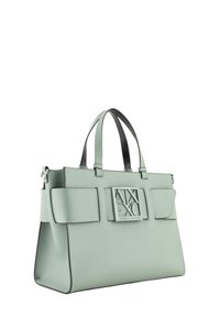 Borsa strutturata verde menta realizzata in pelle liscia, con una placca logo prominente, doppi manici superiori e un bordo nero in contrasto.