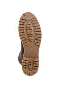 Schwarze Schuhe mit einer strukturierten Oberseite und einer flexiblen, gemusterten Gummisohle. Die Sohle verfügt über tiefe Rillen für besseren Halt.