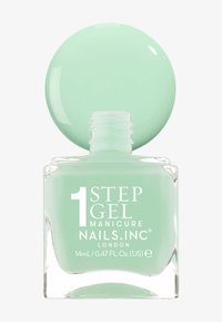 Smalto per unghie verde menta in una bottiglia di vetro trasparente con un cappuccio rotondo. Testo sulla bottiglia: "MANICURE UN PASSO NAILS.INC LONDRA." 14ml.