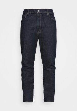 Dark blue jeans with a straight fit, made of denim. Features include a button closure, five pockets, and contrast stitching.