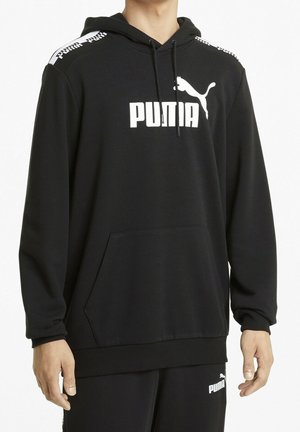 Sweat à capuche noir en tissu doux, doté d'une poche kangourou, d'un logo PUMA blanc sur la poitrine et d'accents de la marque sur les épaules.