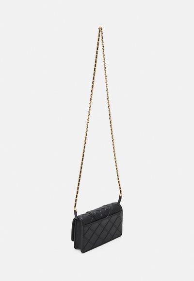 Black quilted leather crossbody bag with a gold chain strap, featuring a flap closure and embossed logo on the front.