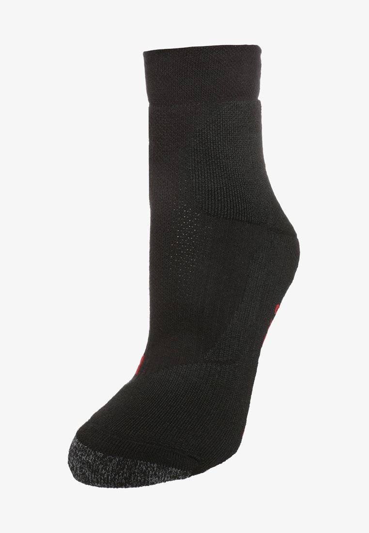 Chaussette noire jusqu'à la cheville avec un design texturé, un orteil renforcé et un accent rouge. Comprend des zones en maille pour la respirabilité et un ajustement snug.