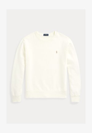 Kremfarget hettegenser laget av mykt stoff. Har rund hals, lange ermer, ribbestrikkede mansjetter, og et lite brodert logo i gull på brystet.