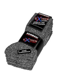 Schwarze und graue Socken im Bündel verpackt. Mit robustem Design und verstärkten Zehen und Fersen. Auf dem Etikett steht "OHNE GUMMIDRUCK".