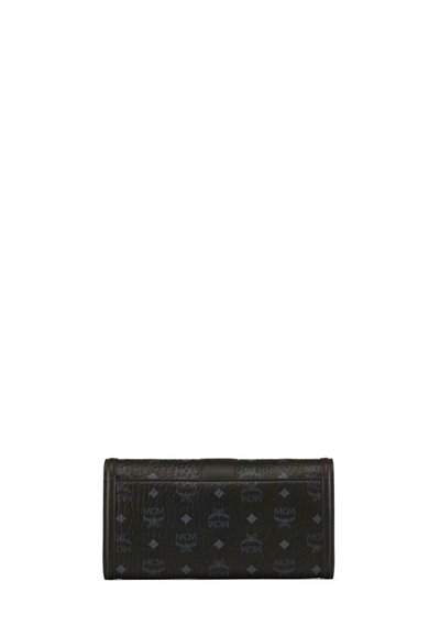 Black leather wallet featuring embossed MCM logo pattern, rectangular shape, and smooth texture with subtle shine. Accents in dark tones.