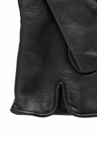 Schwarze Lederhandschuhe mit glatter Textur und umschlagbarem Manschettendesign. Mit verdeckten Nähten und einem eleganten, minimalistischen Look.