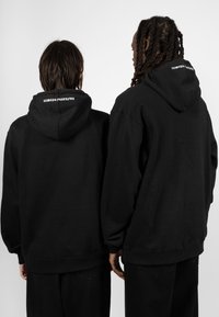 Wasted Paris HOODIE PITCHER UNISEX - Sweatshirt - black