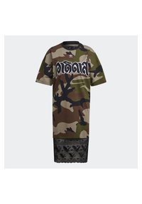 Camouflage-patterned oversized t-shirt dress with black lace trim at the hem and large white stylized text across the chest.