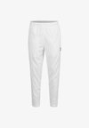 HERITAGE - Tracksuit bottoms - white white