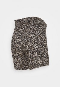 Sorte shorts med et blomsterprint med beige blade, elastisk talje og afslappet pasform. Blødt stof med en glat tekstur.