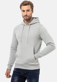 Helle graue Kapuzenjacke aus weichem Stoff, mit einer Fronttasche, verstellbaren Kordelzügen und gerippten Bündchen und Saum.