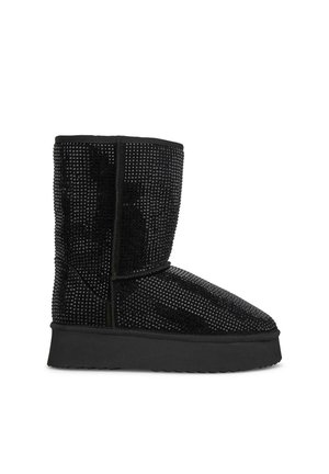 Schwarzer Knöchelstiefel mit einer strukturierten, glitzernden Oberfläche aus kleinen Nieten. Verfügt über eine abgerundete Zehenpartie und eine flache Gummisohle.