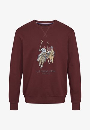 Bordeauxrode sweatshirt met een ontwerp van twee polospelers te paard en de tekst "U.S. Polo Assn. Since 1890" onder de afbeelding.