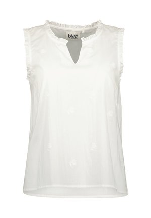 Blouse blanche sans manches avec col et bords des bras volantés, broderie florale subtile, et une petite ouverture en V au col.