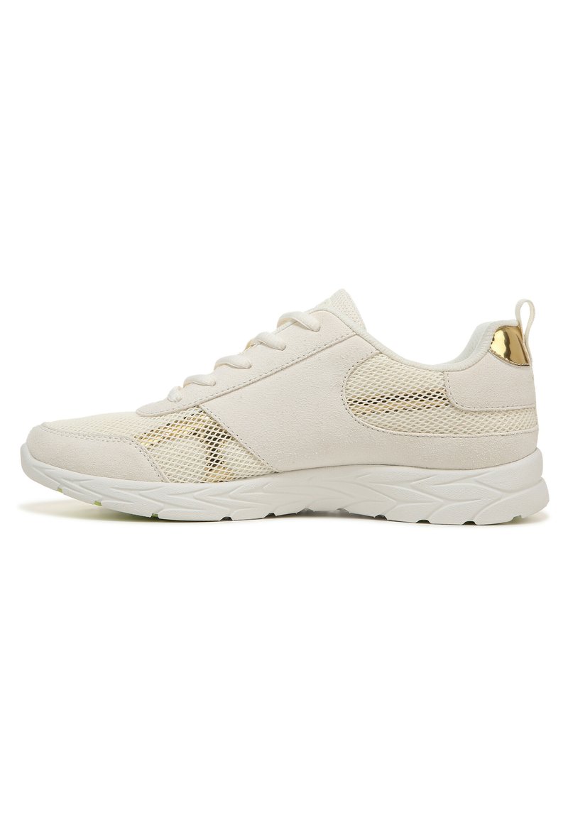 Light beige athletic shoe with mesh panels, smooth suede texture, lace-up design, and a metallic gold accent on the heel. Rubber sole.
