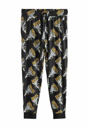 Schwarze Jogginghosen mit einem sich wiederholenden Muster aus silbernen Engeln und gelbem "NIRVANA"-Text. Elastischer Bund mit einem gerippten Knöcheldesign.