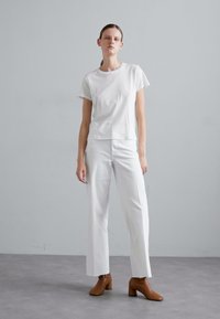 FRAME PALAZZO RAW AFTER - Wide leg - white